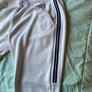 Brown/tan Nike joggers